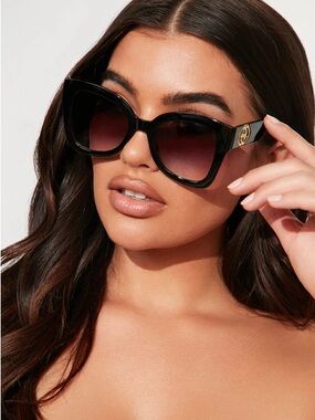 Black Oversized Cat-Eye Sunglasses with Gold Logo Accent